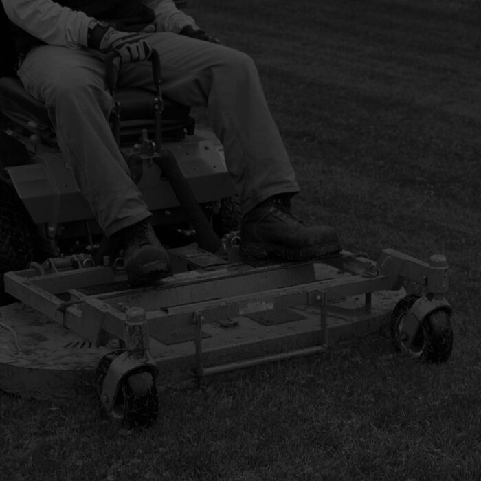 Man riding lawnmower